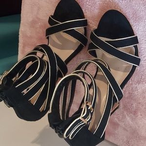 Black heels with gold trim